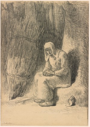 Woman seated beside a tree